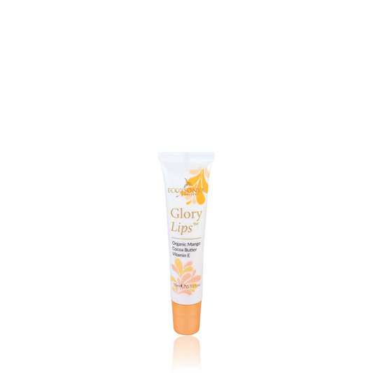 A tube of Eco Tan lip balm called "Glory Lips" contains organic mango, shea butter, and vitamin E. The white tube is adorned with vibrant orange and yellow floral designs.