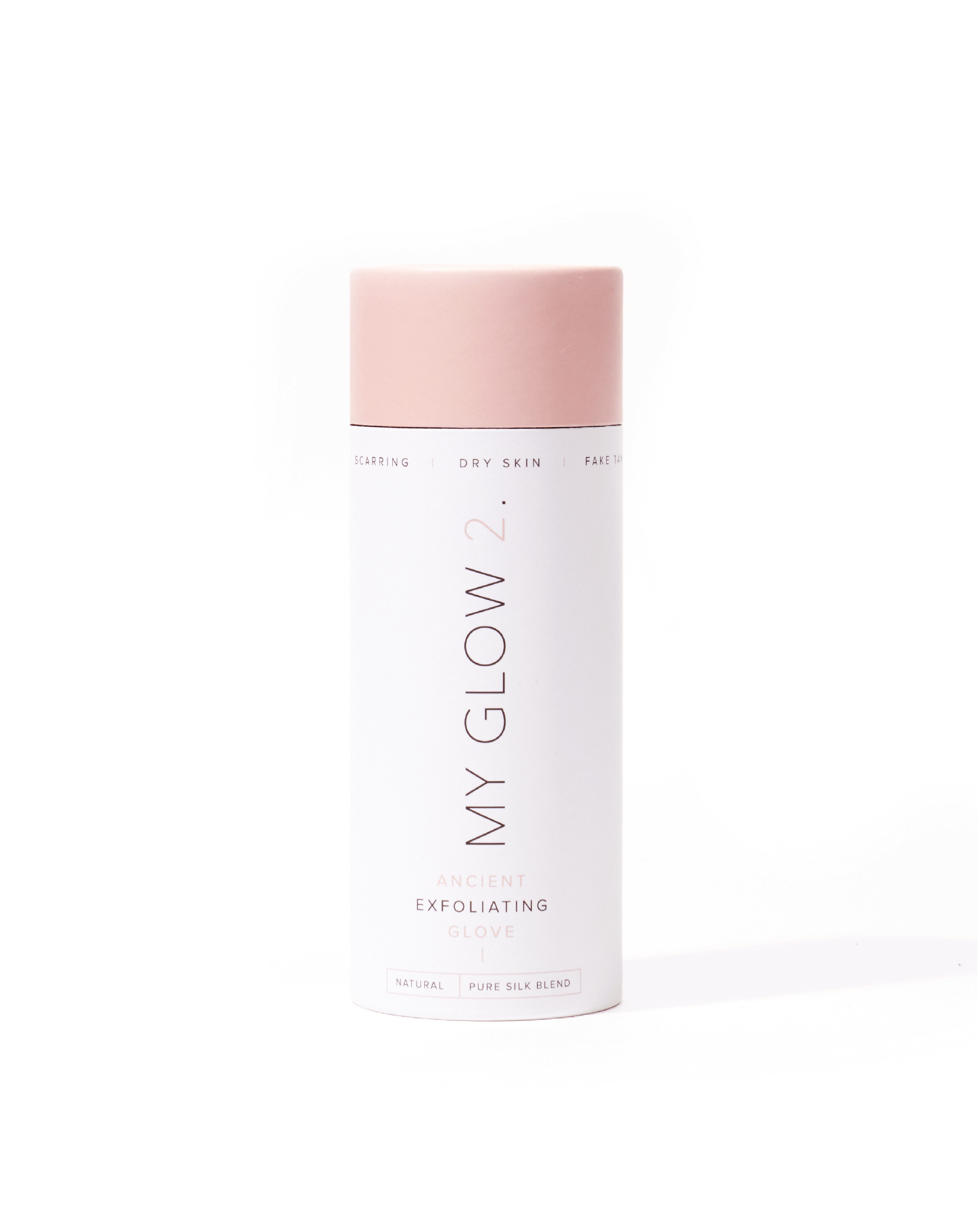 The My Glow 2 Glove by My Glow 2 comes in a cylindrical white container with a pink lid and is designed to address scarring, dry skin, and fake tan removal. It features a luxurious natural pure silk blend and is carefully handmade to provide an elegant exfoliation experience.